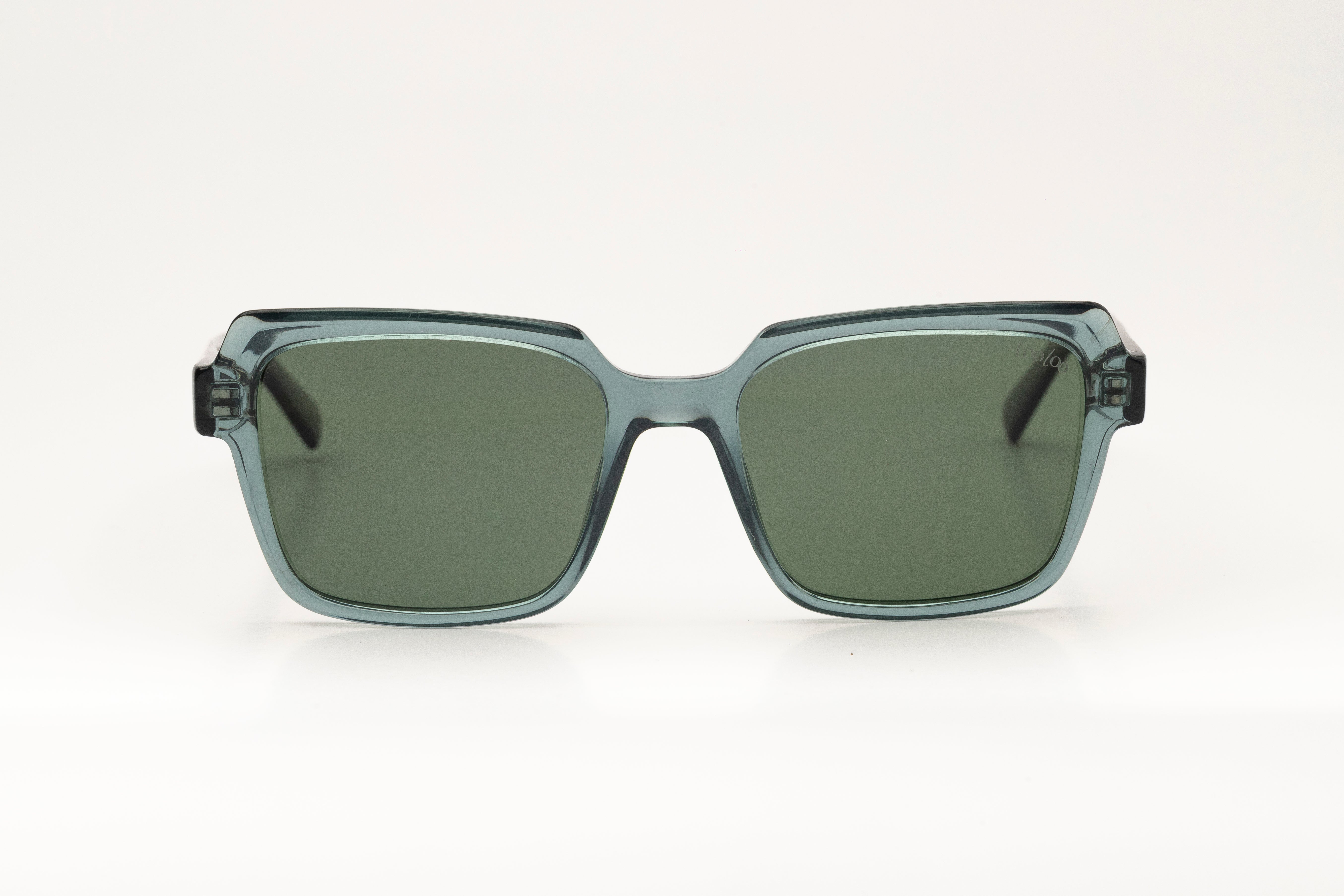 Sunglasses with blue and green acetate frame, and green lenses on a white background.