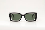 Sunglasses with black and crystal acetate frame on a white background.