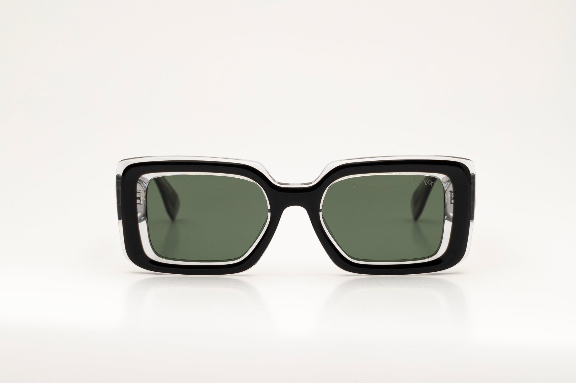 Sunglasses with black and crystal acetate frame on a white background.