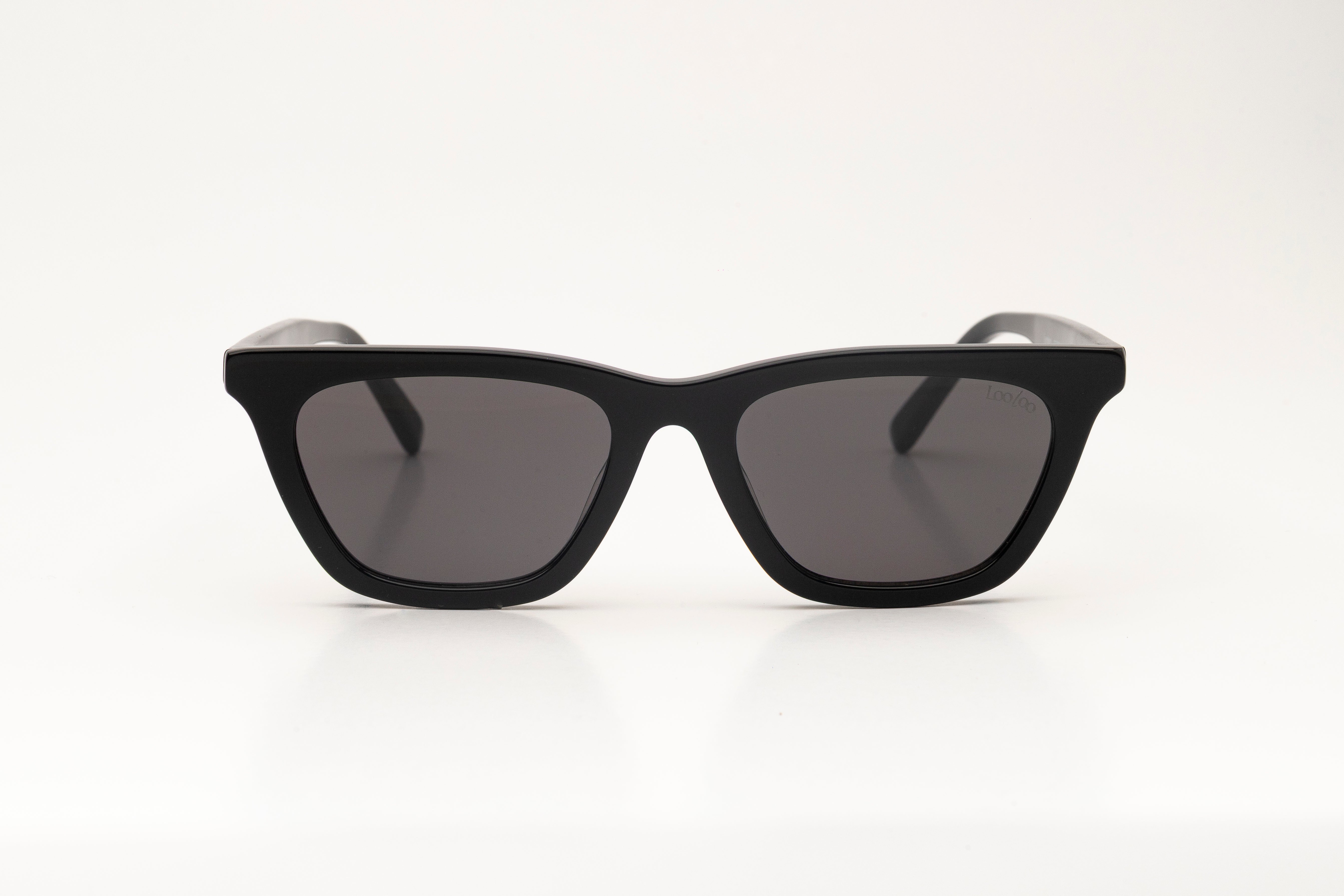 Sunglasses with black acetate frame  on a white background.