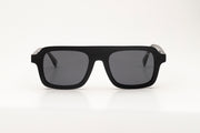 Sunglasses with black acetate frame on a white background.
