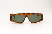 Sunglasses with tortoise acetate frame on a white background