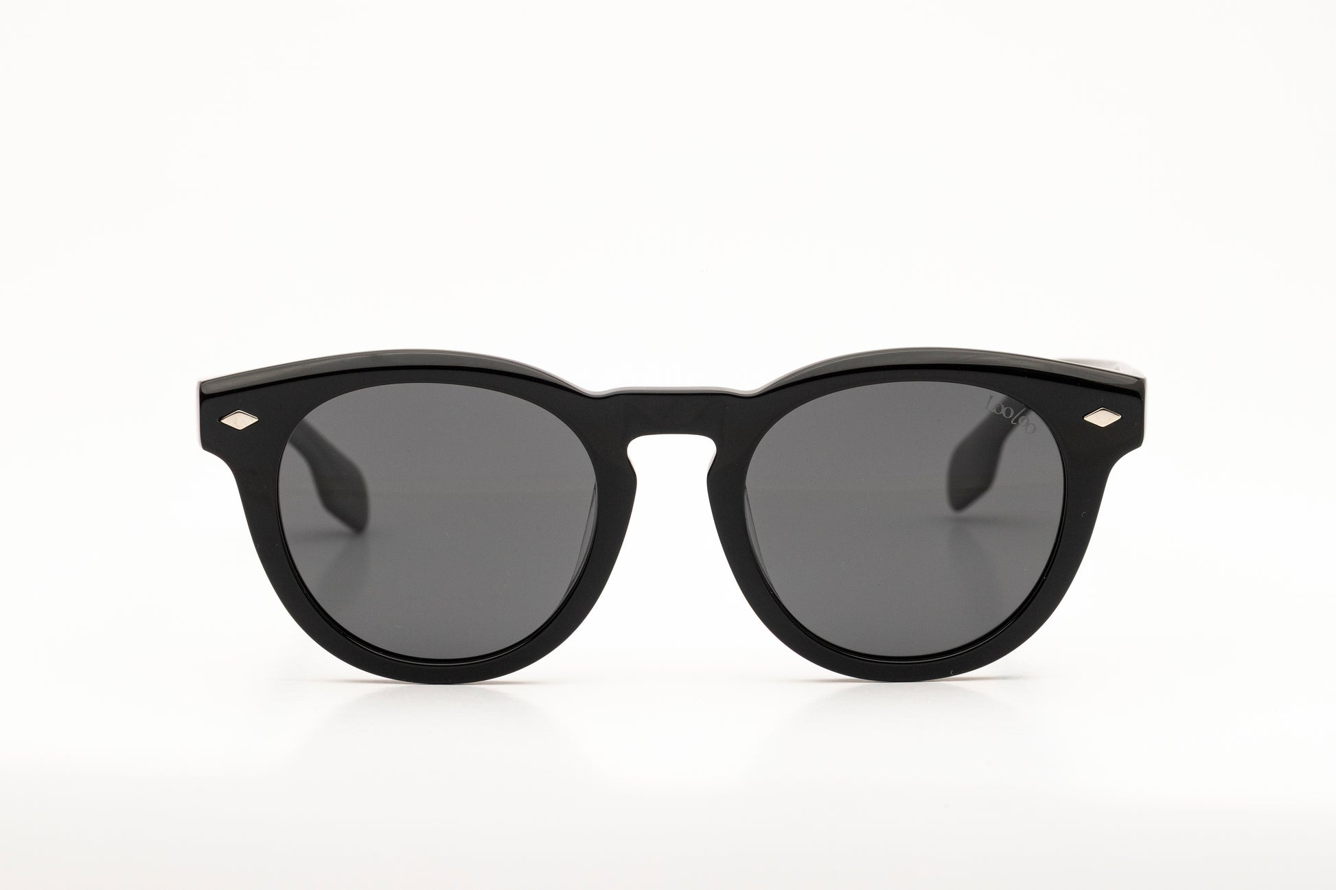 Sunglasses with black acetate frame  on a white background.