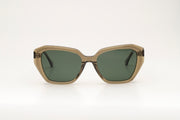 Sunglasses with green acetate frame and green lenses on a white background